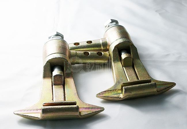 固定抱索器有哪些常見結(jié)構(gòu)類型及其工作原理？